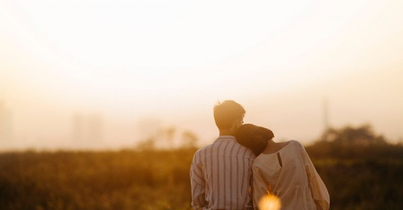 Relationship - Man and Woman Near Grass Field