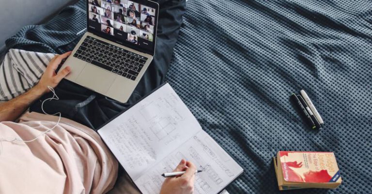 Online Courses - A Man Sitting on the Bed