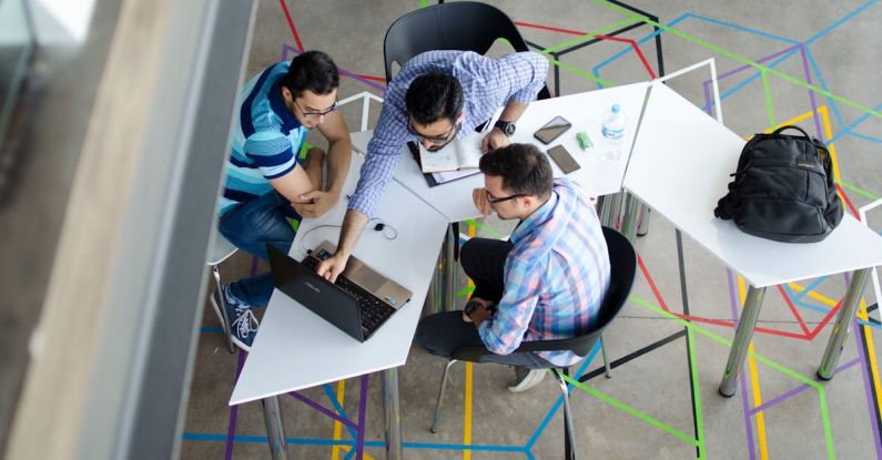 Networking - Top-view Photo of 3 Men in Front of Laptop