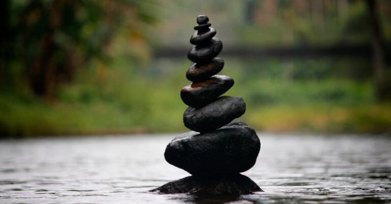 Balance - Black Stackable Stone Decor at the Body of Water